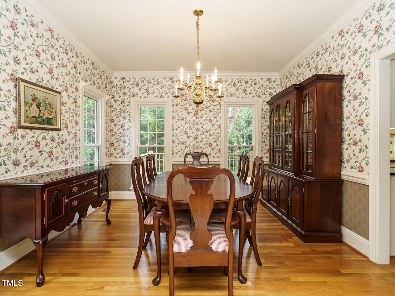 7201 Jonathan Drive Wendell, NC 27591 - Photo 10 of 43 a view of a dining room with furniture window and wooden floor