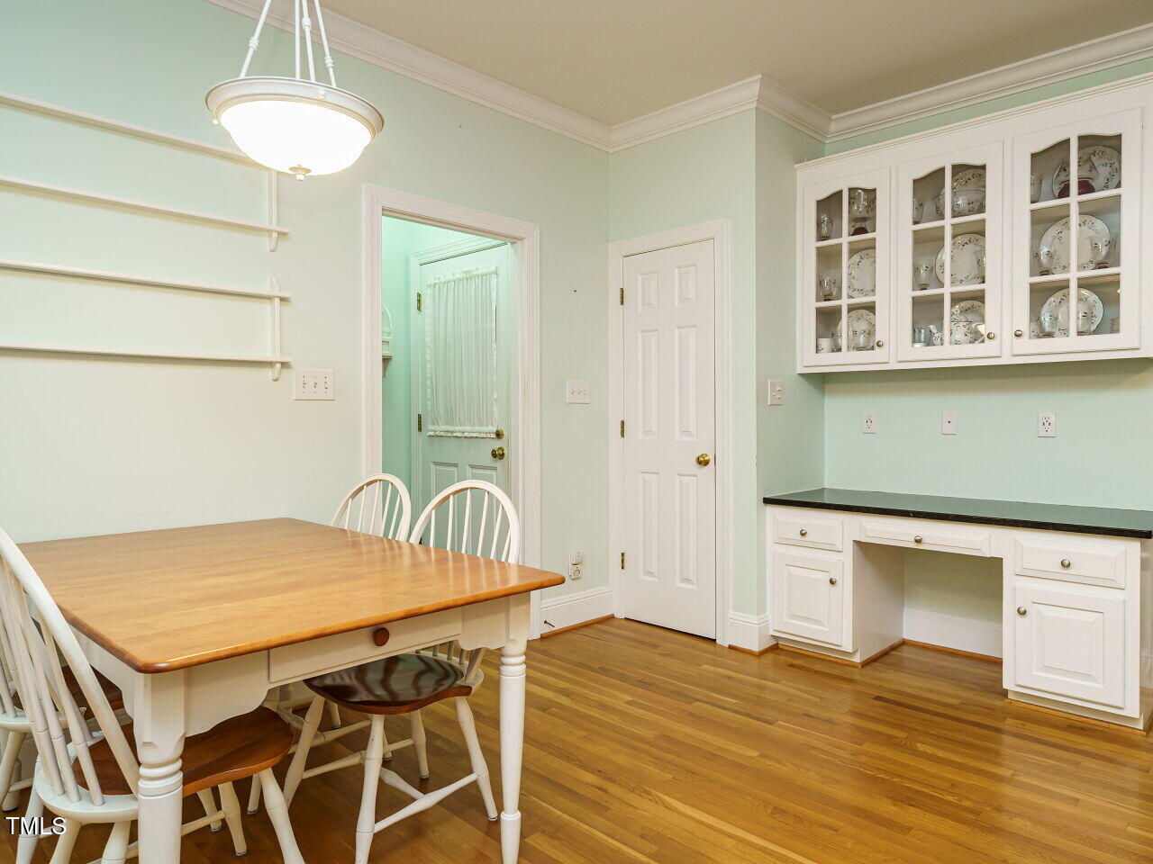 7201 Jonathan Drive Wendell, NC 27591 - Photo 16 of 43 a view of a dining room with furniture and wooden floor