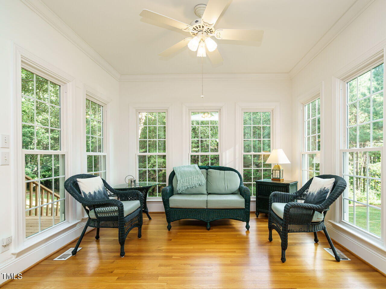 7201 Jonathan Drive Wendell, NC 27591 - Photo 17 of 43 a living room with furniture and a large window with wooden floor