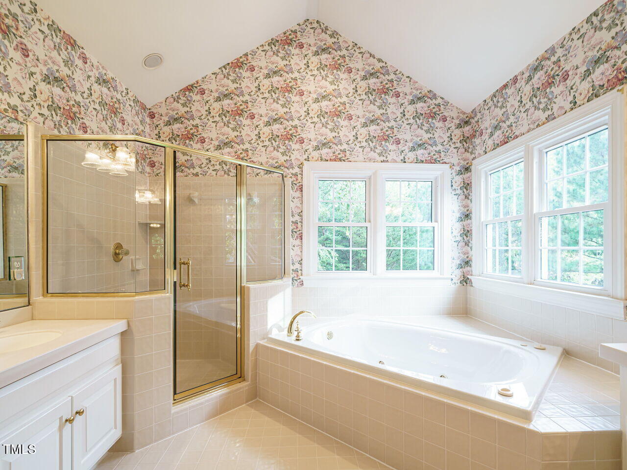7201 Jonathan Drive Wendell, NC 27591 - Photo 23 of 43 a bathroom with a bathtub and a shower