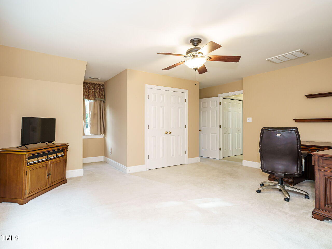 7201 Jonathan Drive Wendell, NC 27591 - Photo 31 of 43 a view of workspace with livingroom
