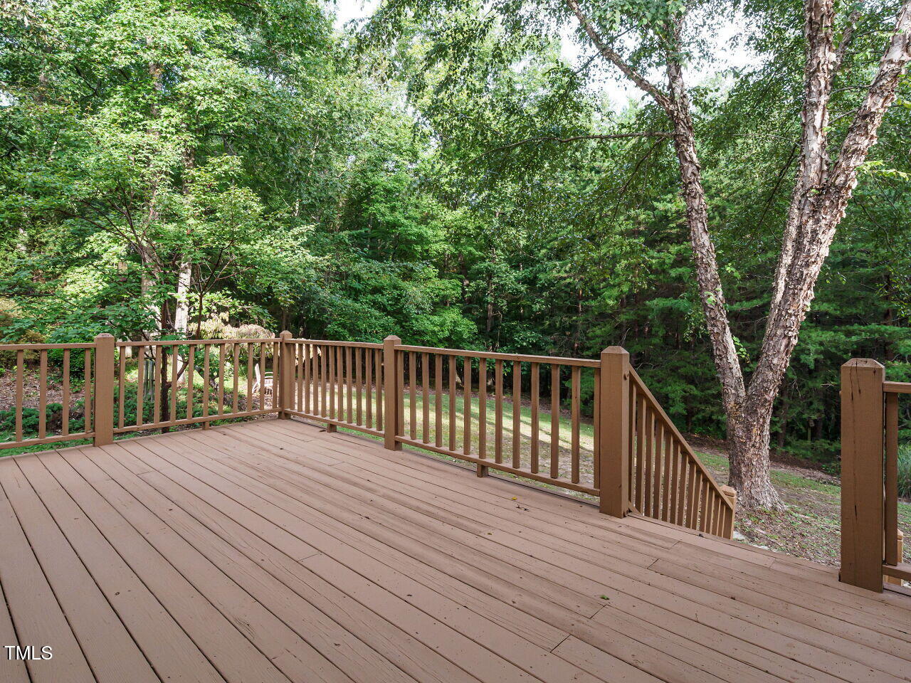 7201 Jonathan Drive Wendell, NC 27591 - Photo 34 of 43 a view of deck with wooden floor and fence