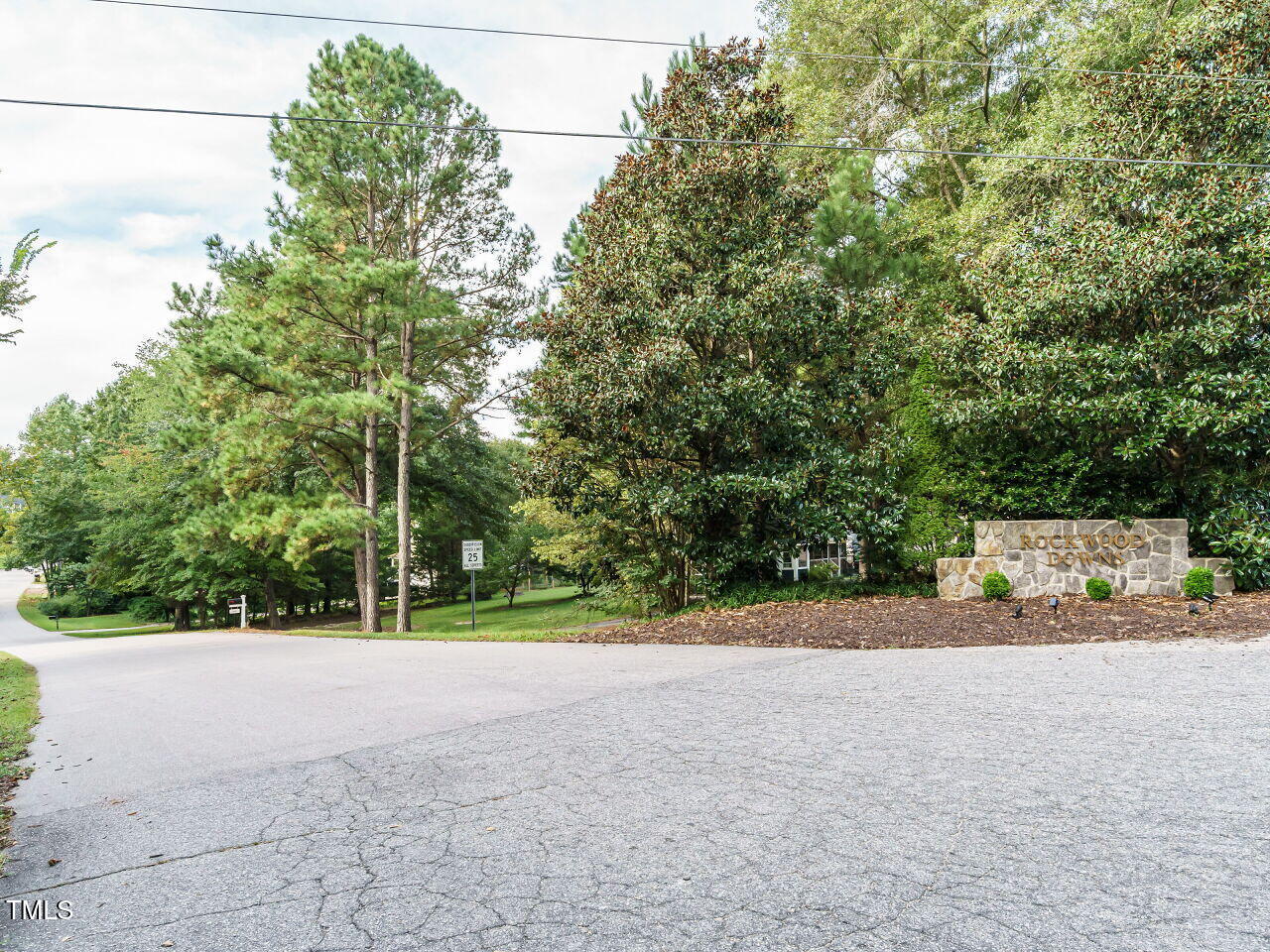 7201 Jonathan Drive Wendell, NC 27591 - Photo 40 of 43 a view of a road with a yard