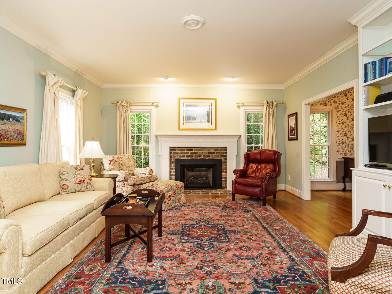 7201 Jonathan Drive Wendell, NC 27591 - Photo 5 of 43 a living room with furniture and a fireplace