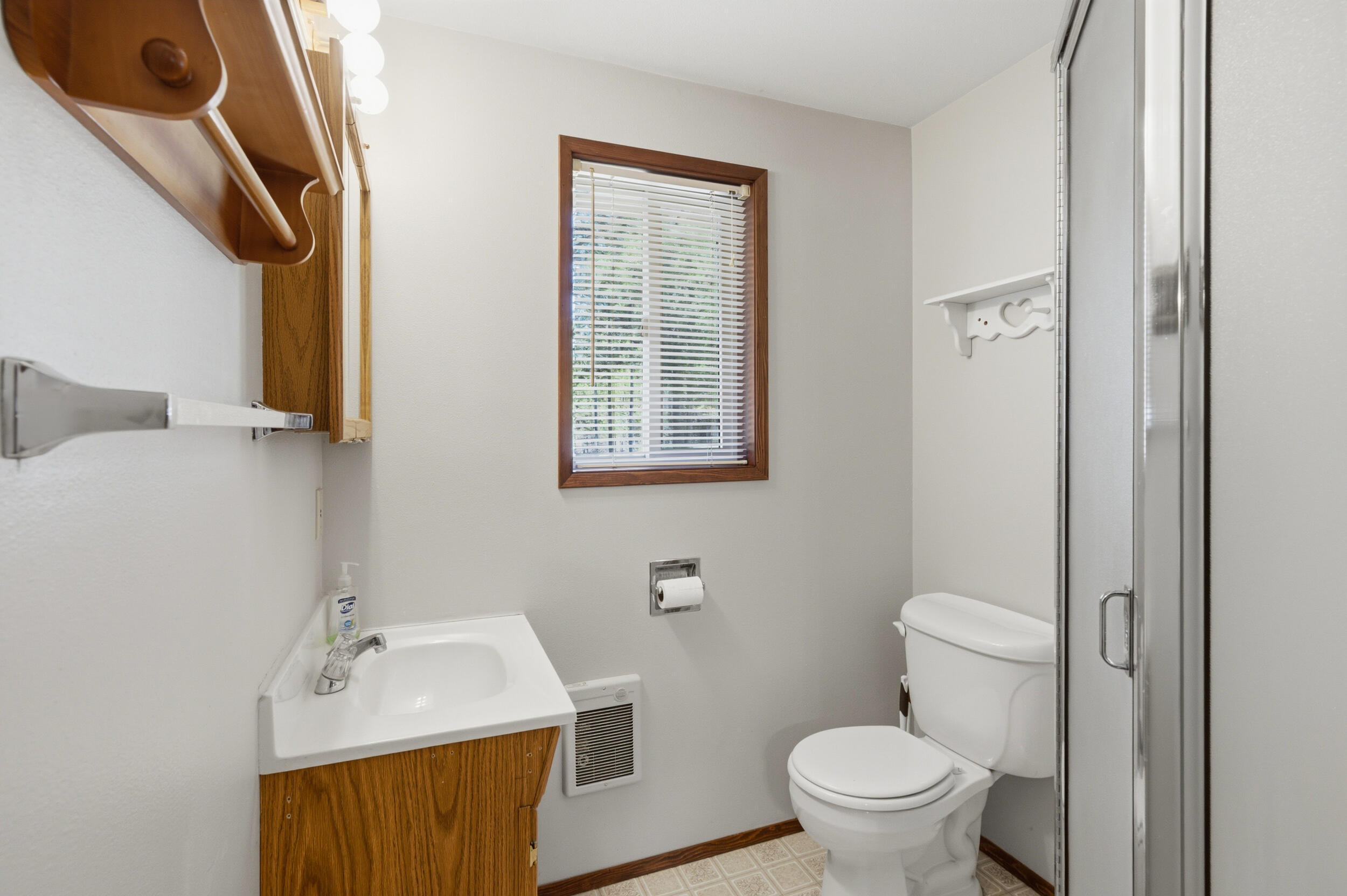 50868 Doe Loop La Pine, OR 97739 - Photo 31 of 51 a bathroom with a sink a toilet and mirror