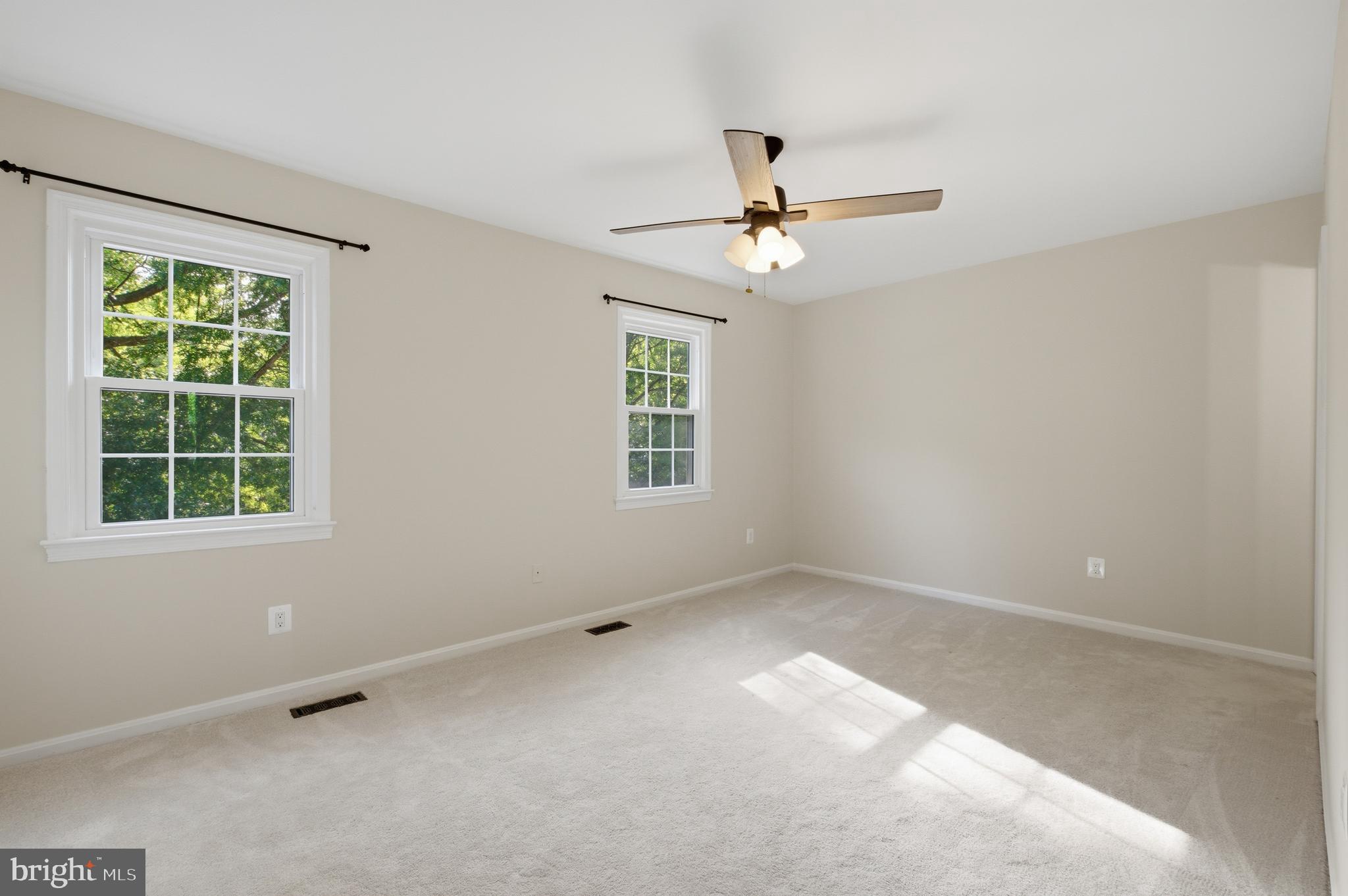8575 Tyrolean Way Springfield, VA 22153 - Photo 13 of 29 a view of empty room with windows