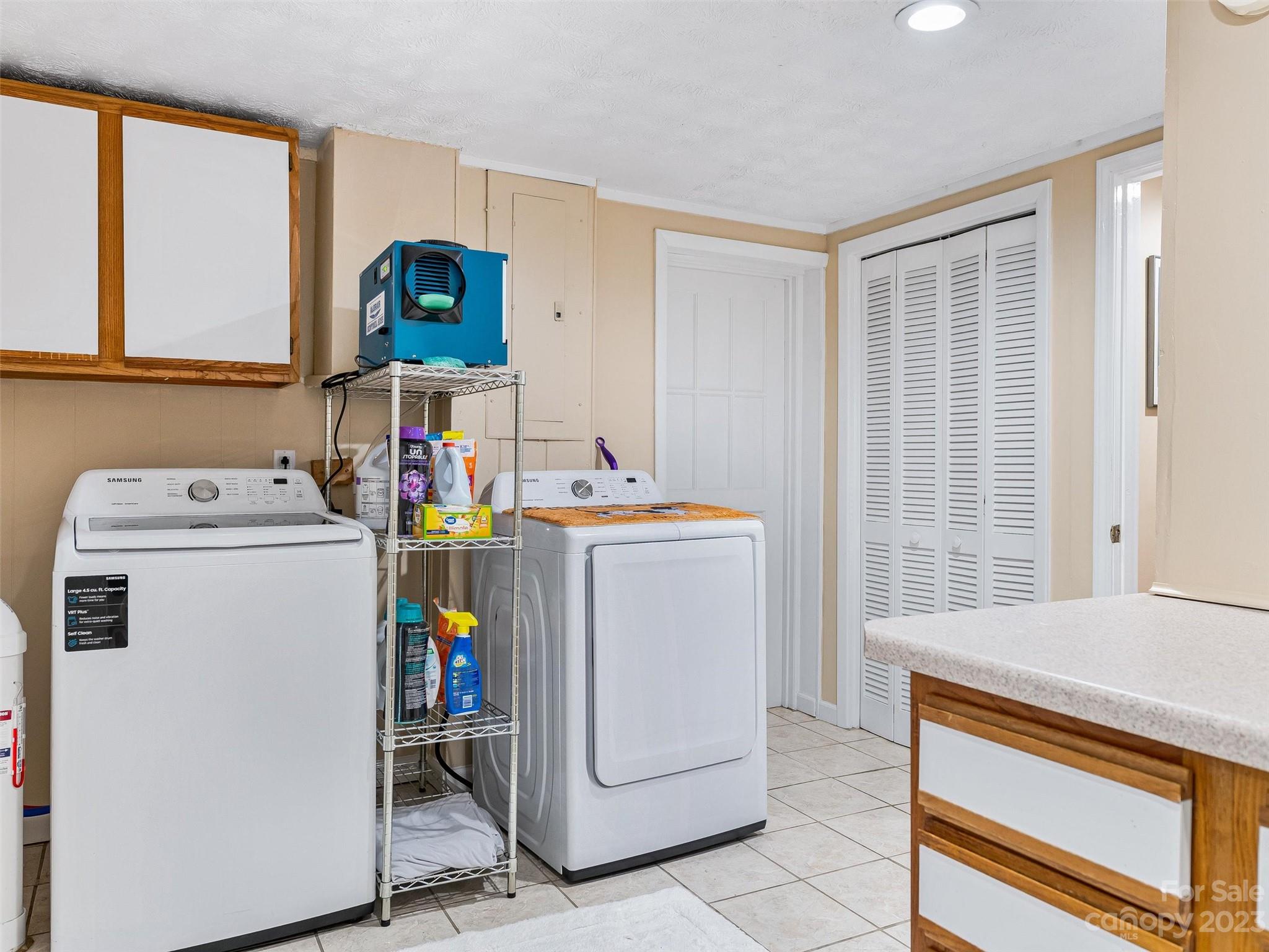 176 Laurel Branch Road Maggie Valley, NC 28751 - Photo 24 of 45 a utility room with dryer and washer