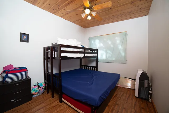 a kitchen with stainless steel appliances granite countertop a stove and a refrigerator