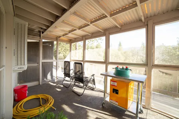 a living room with furniture and a table