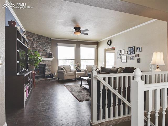 11350 Calgary Road Peyton, CO 80831 - Photo 2 of 29 9 ft. ceilings with tons of natural light.