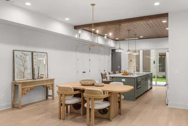 a dining room with granite countertop furniture and window