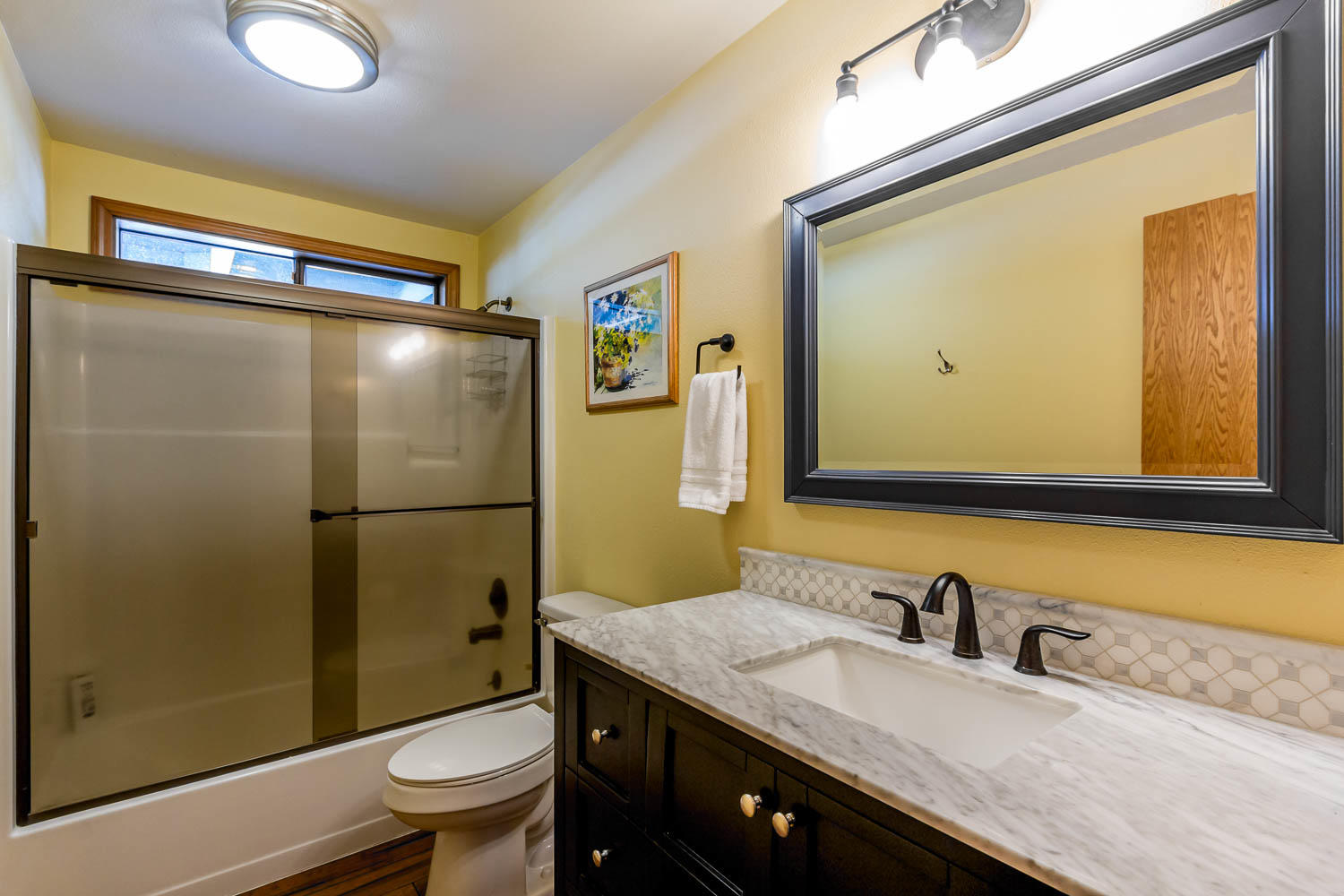 17704 Rogue Lane Sunriver, OR 97707 - Photo 22 of 26 a bathroom with a granite countertop sink toilet and shower
