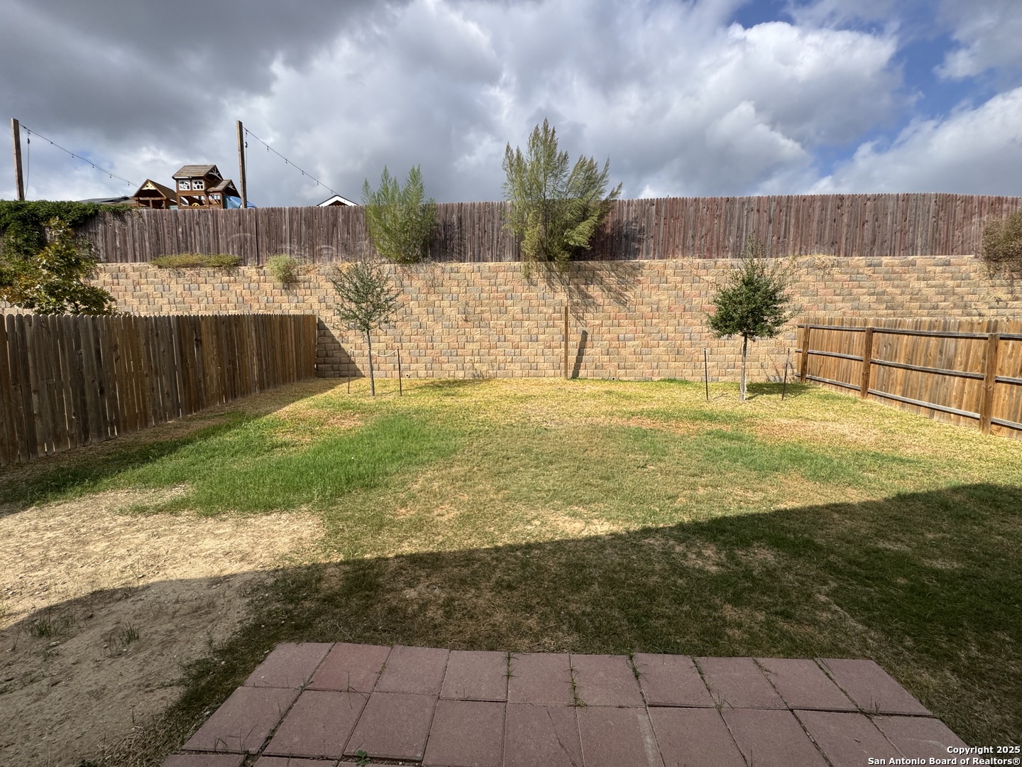 5523 Basil Chase St. Hedwig, TX 78152 - Photo 15 of 15 a view of a backyard