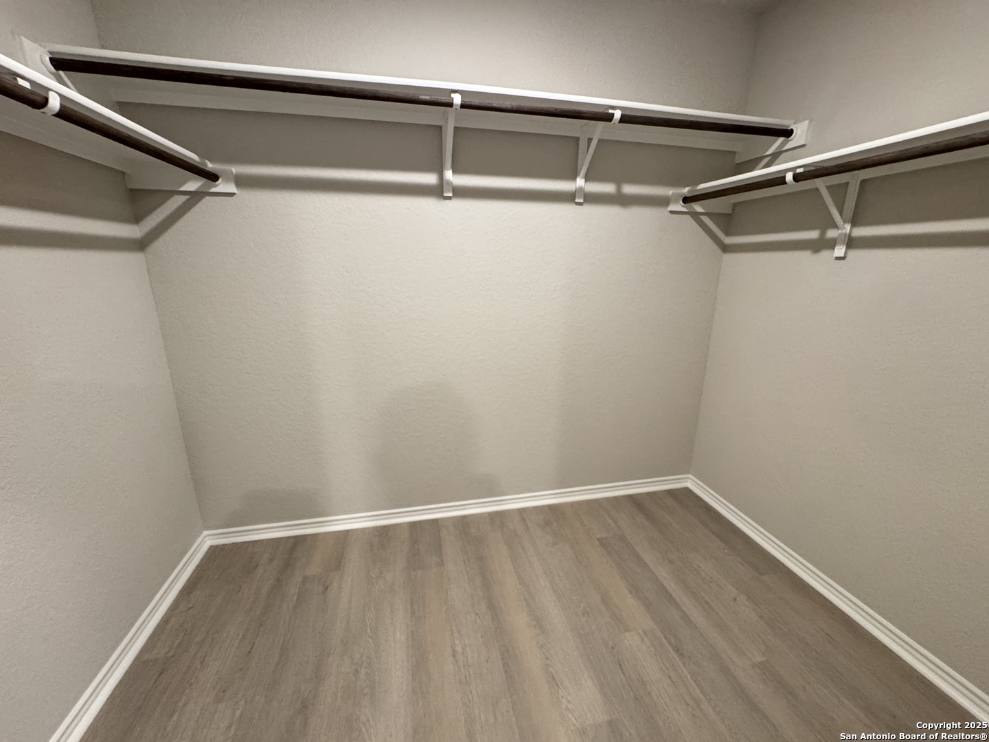 5523 Basil Chase St. Hedwig, TX 78152 - Photo 8 of 15 a view of a room with racks on the wall