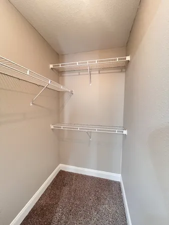 a view of a room with racks on the wall