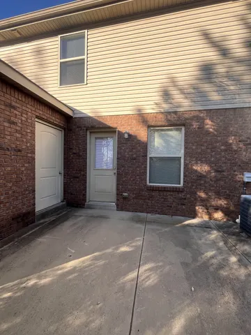 a view of a house with a street