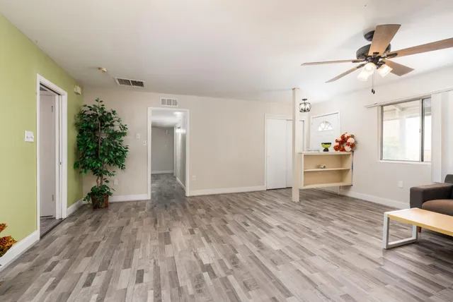 a view of an empty room and window
