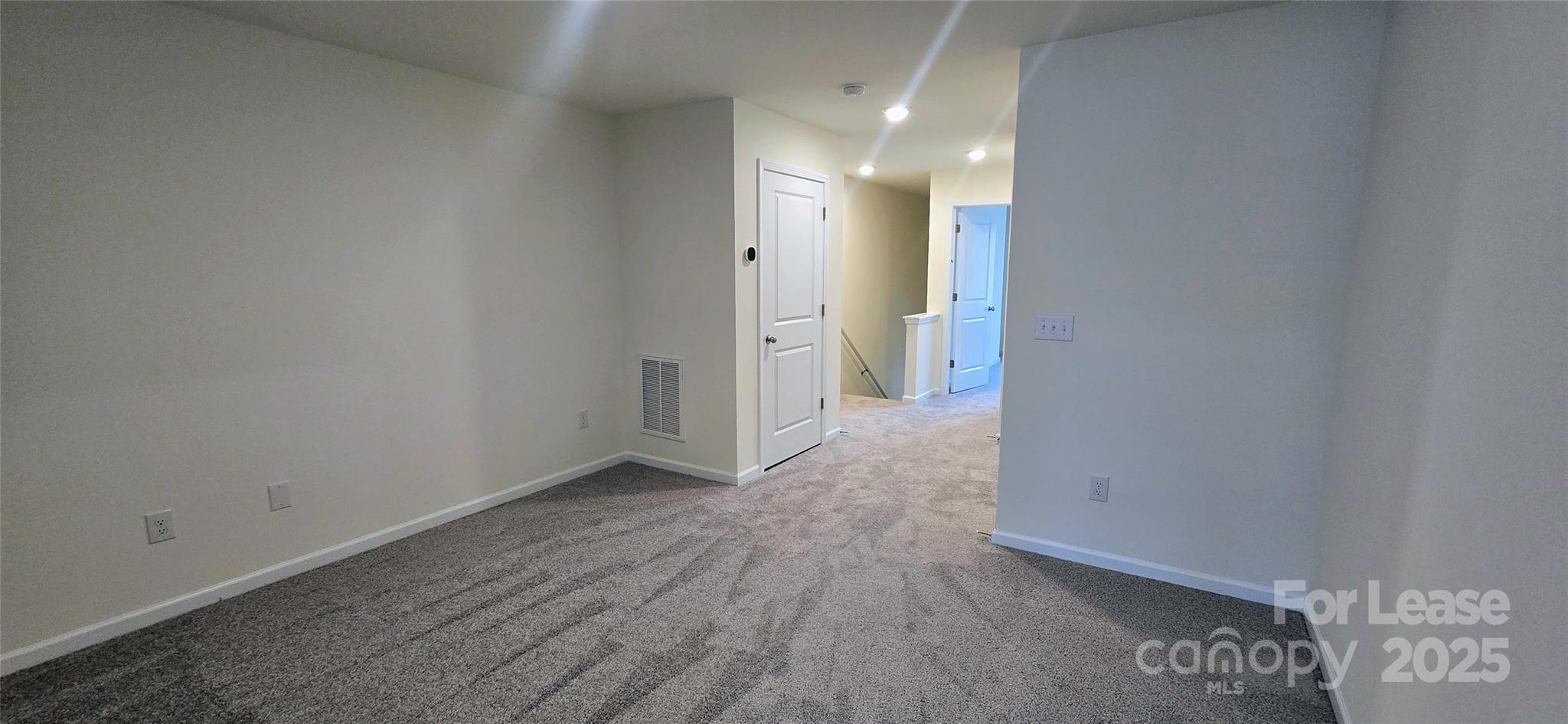 1931 B Tranquility Circle Newton, NC 28658 - Photo 18 of 20 a view of a hallway with wooden floor