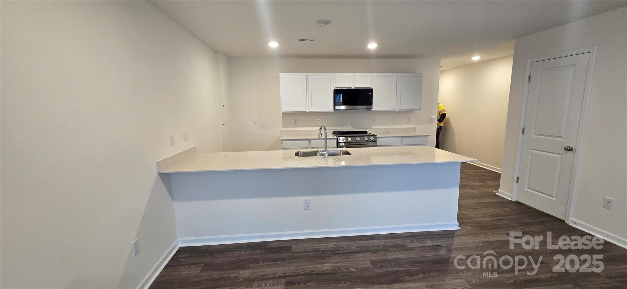 1931 B Tranquility Circle Newton, NC 28658 - Photo 3 of 20 a room with a sink furniture and a mirror