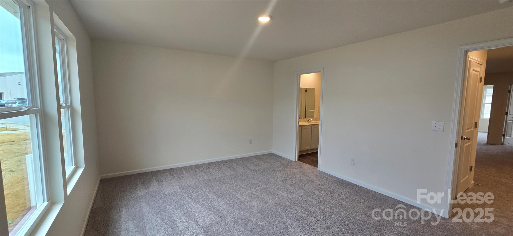 1931 B Tranquility Circle Newton, NC 28658 - Photo 7 of 20 an empty room with windows