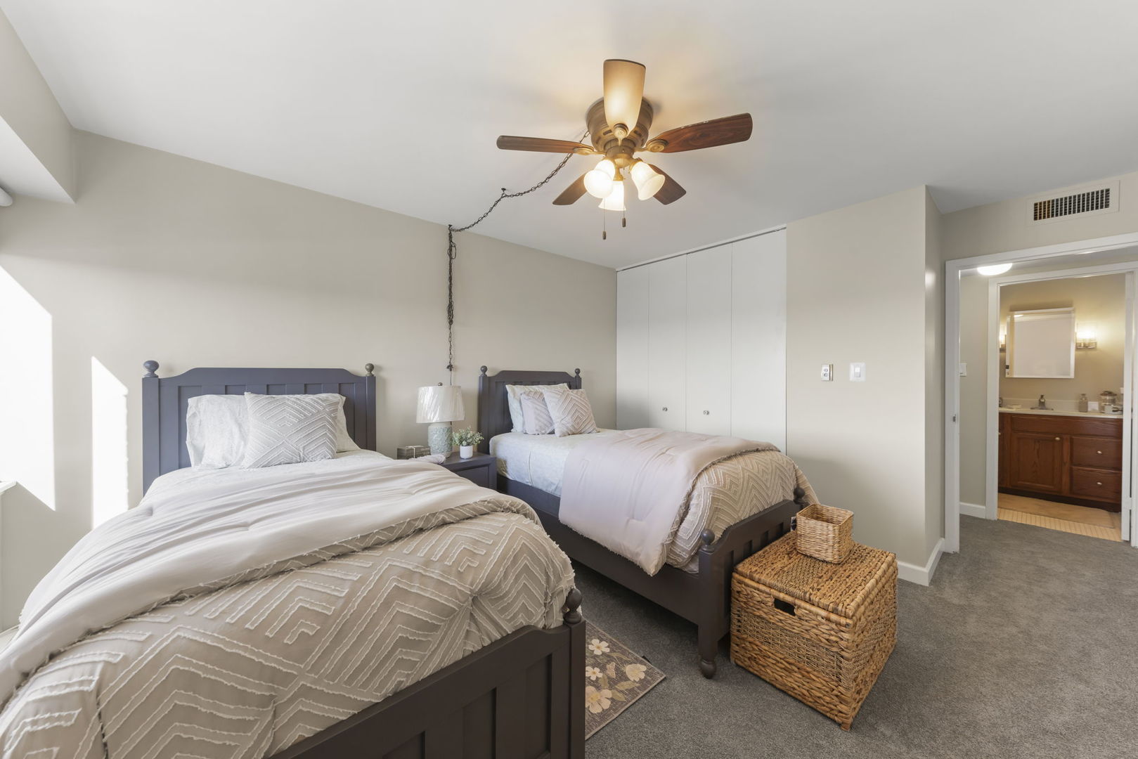 141 North La Grange Road, Unit 803 La Grange, IL 60525 - Photo 15 of 21 a bedroom with two beds and ceiling fan