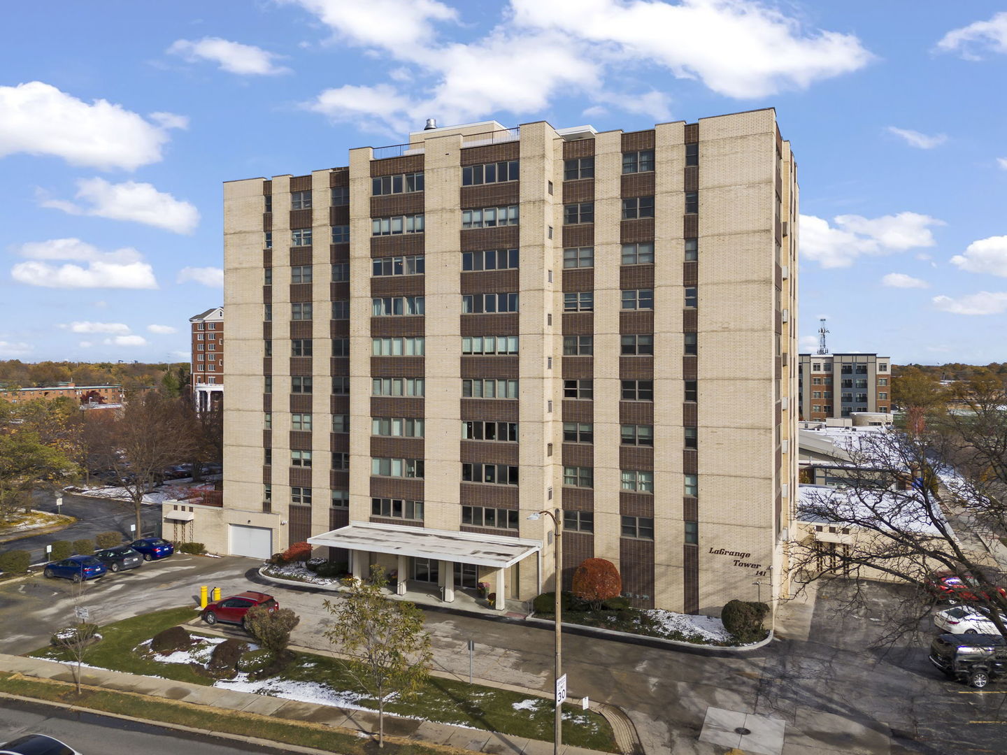 141 North La Grange Road, Unit 803 La Grange, IL 60525 - Photo 2 of 21 a city view with tall buildings