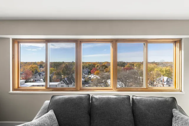 a living room filled with furniture and a window