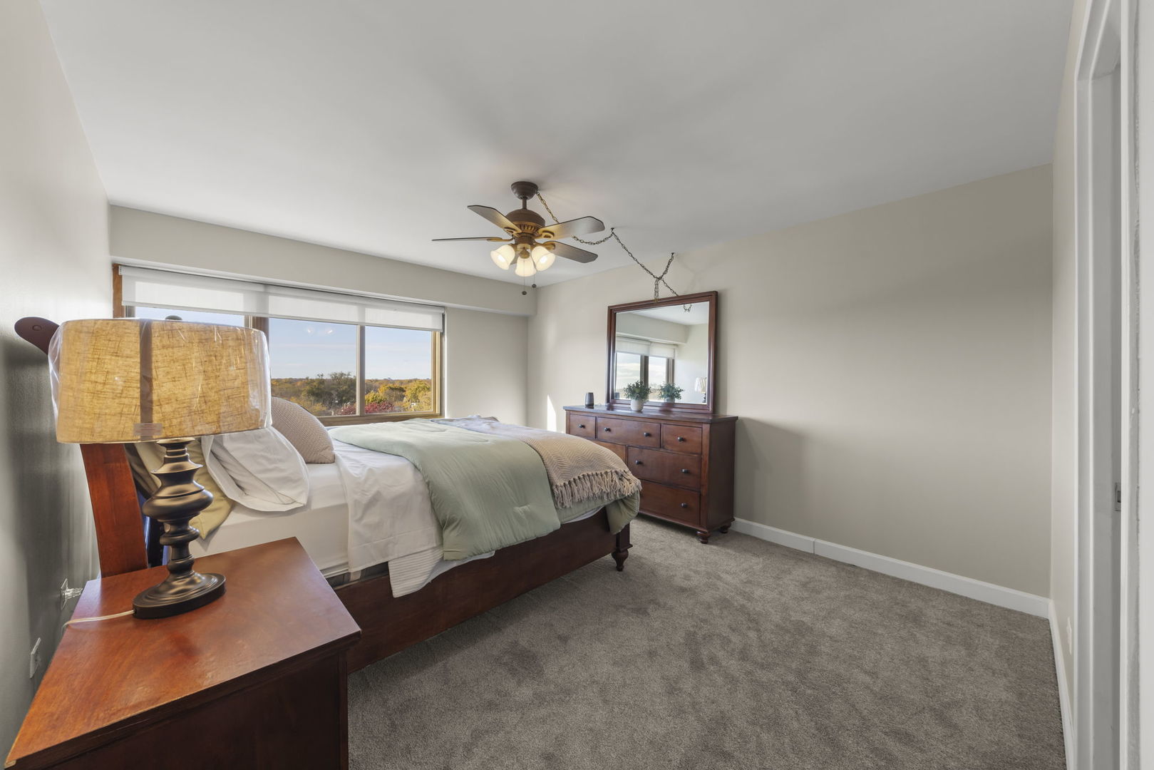 141 North La Grange Road, Unit 803 La Grange, IL 60525 - Photo 10 of 21 a bedroom with a bed and window
