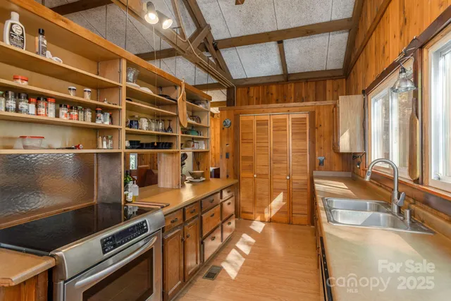 a view of a living room with a large window