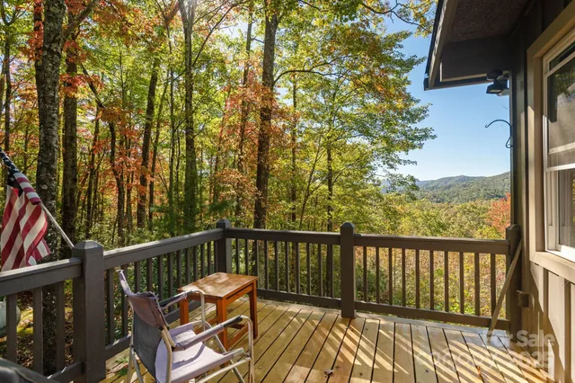 a view of balcony with furniture