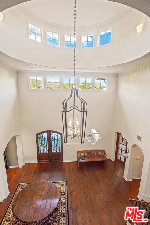 1452 Vía Cresta Pacific Palisades, CA 90272 - Photo 12 of 24 a living room with furniture and a wooden floor