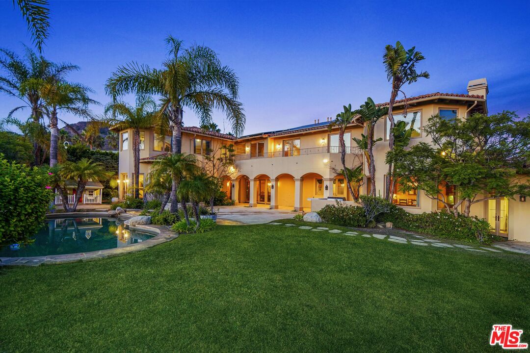 1452 Vía Cresta Pacific Palisades, CA 90272 - Photo 4 of 24 a view of a house with a yard