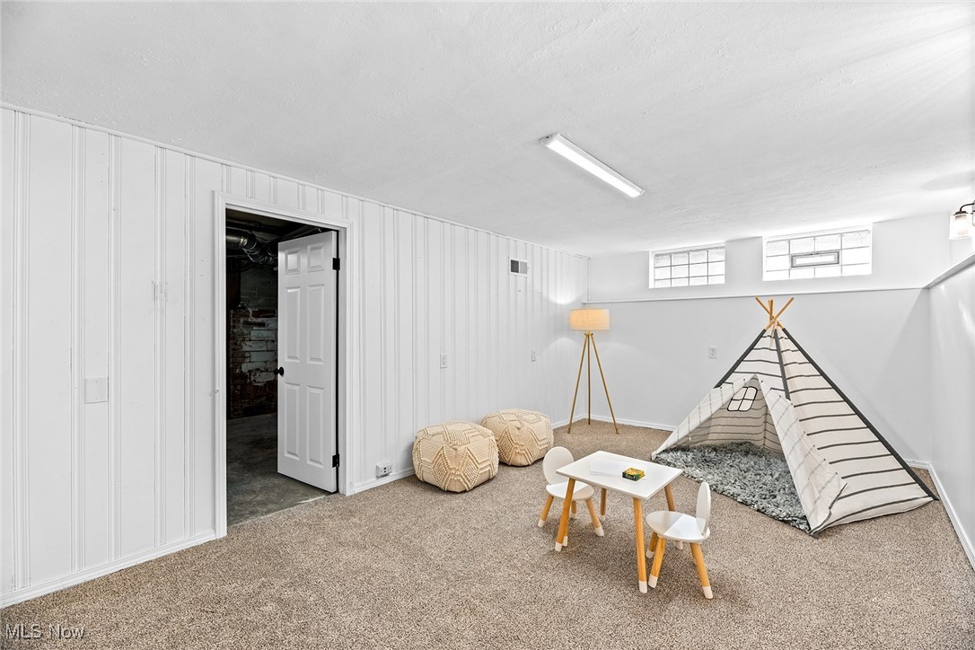 7719 Ackley Road Parma, OH 44129 - Photo 30 of 35 Playroom with carpet flooring and baseboards