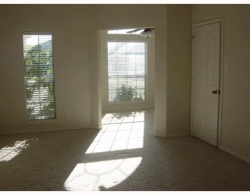 a living room with a large window