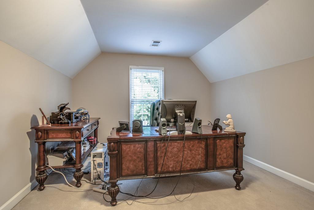 438 Beauchamp Circle Franklin, TN 37067 - Photo 16 of 30 a view of a workspace with furniture and a window