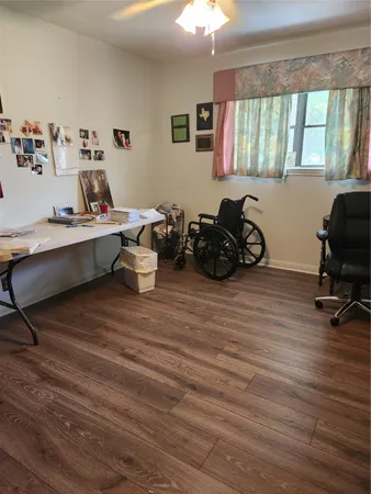 a room with chair and window