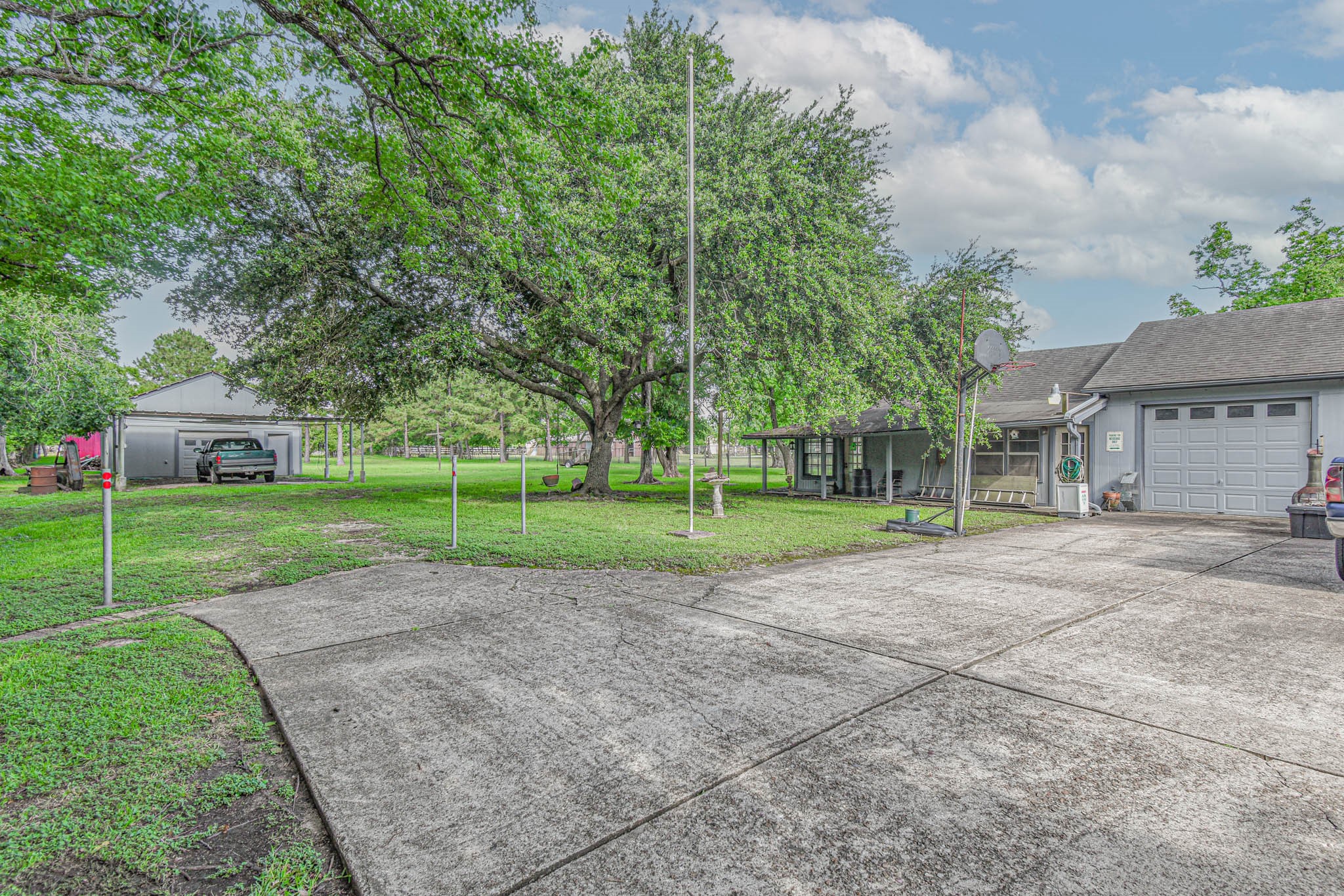 4503 Allen-Genoa Road Pasadena, TX 77504 - Photo 45 of 50 ADDITIONAL PARKING, PLUS A VIEW OUT TO DETACHED GARAGE & CAR PORT.