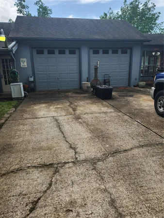 a dinning table and chairs in the patio of a house