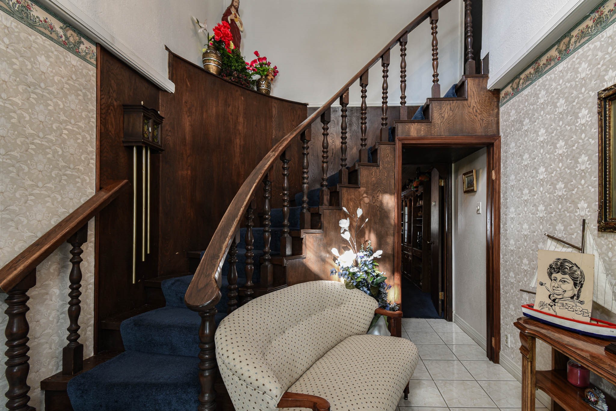 4503 Allen-Genoa Road Pasadena, TX 77504 - Photo 6 of 50 BEAUTIFUL CURVED WOOD STAIRWAY IN THE ENTRY