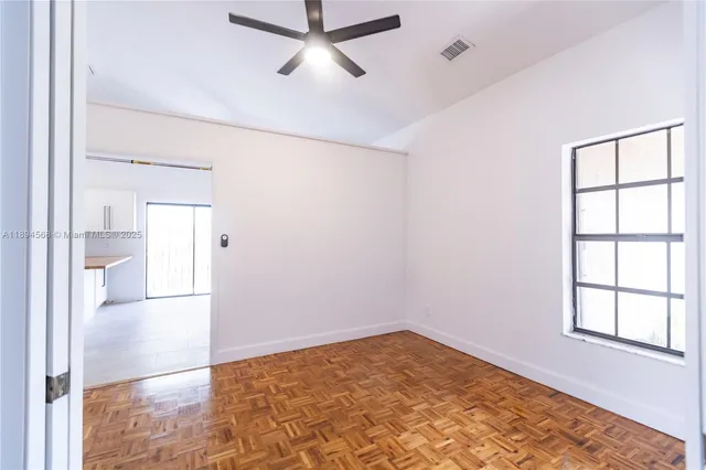 a view of a livingroom with a hardwood floor