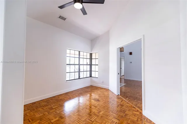 a view of swimming pool with a patio and a garden