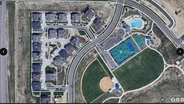 an aerial view of a highlighted house