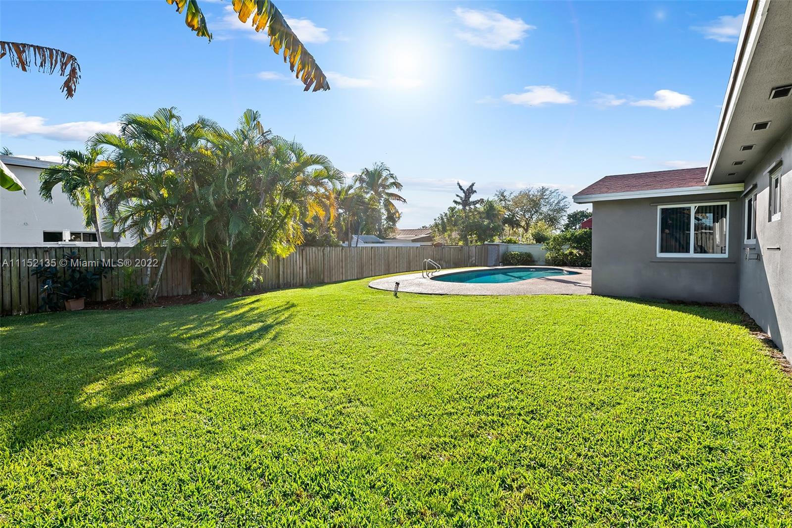 4314 Fillmore Street Hollywood, FL 33021 - Photo 27 of 27 a view of a house with a backyard