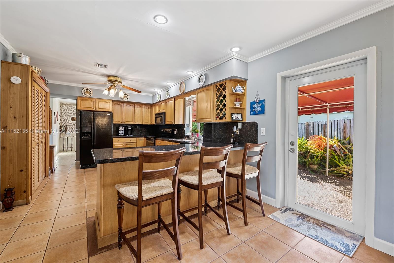 4314 Fillmore Street Hollywood, FL 33021 - Photo 8 of 27 a view of a dining room with furniture