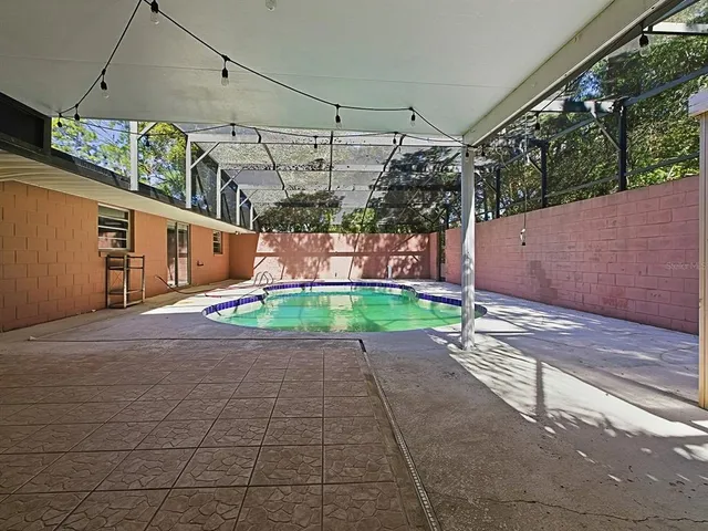 a view of a backyard with a small cabin