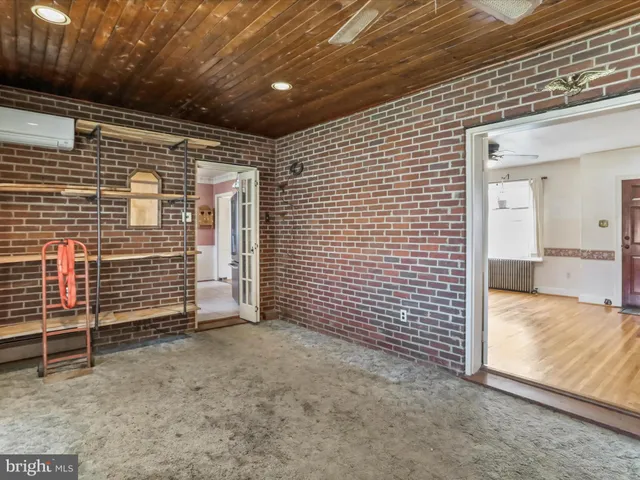 a view of livingroom with an empty space