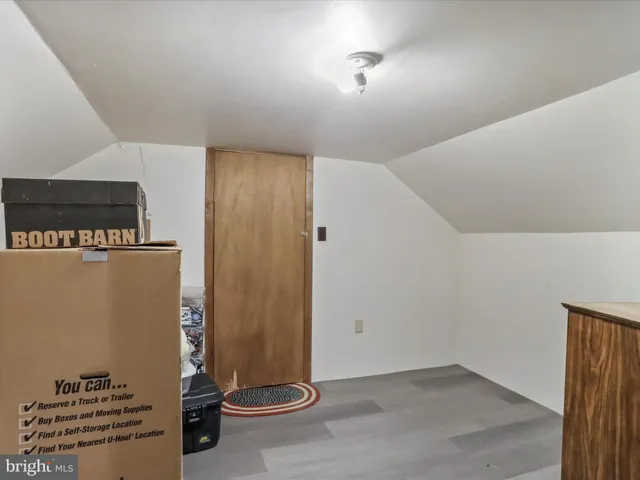 a view of a livingroom with wooden floor