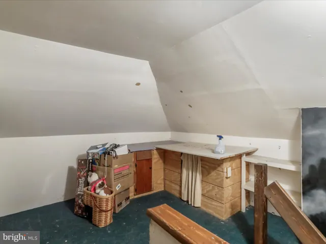 a view of a park with swings and slides