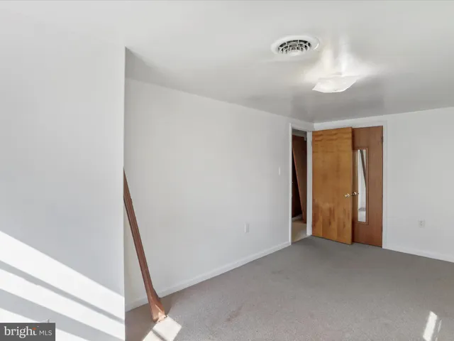 a bathroom with a sink toilet and vanity