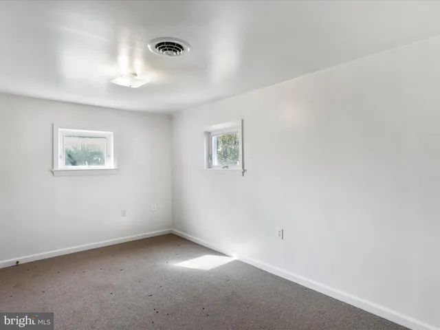 a kitchen with a sink stove and refrigerator